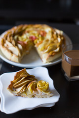 Apple homemade cake in the form of beautiful roses cofee yellow