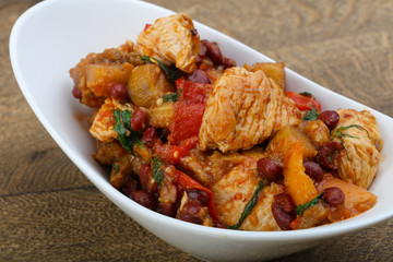 Turkey with beans and tomato