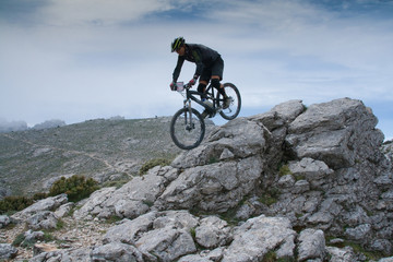 Fototapeta na wymiar Sardinia between mountains and sea - Riding mountain bike