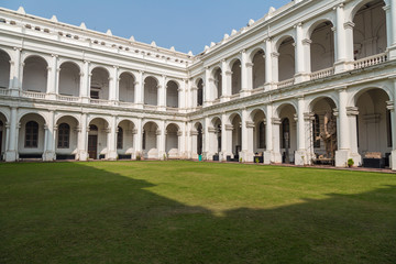 Historic Indian museum gothic architectural building at Kolkata, India inner compound as viewed from the ground floor.