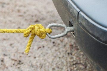 Car tow bar with rope