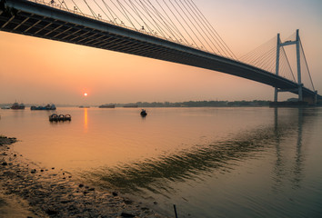 Cable stayed bridge (Vidyasagar Setu) on the river Hooghly at sunset (Silhouette view)