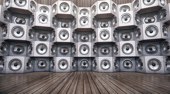 Wall of musical speakers on a wooden background. 3d Illustration