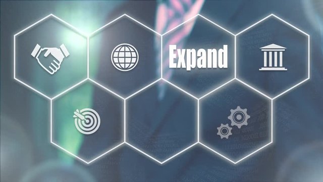 Businessman pressing a Business Expand concept