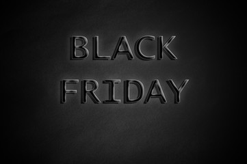 Fototapeta premium Black Friday on dark paper background