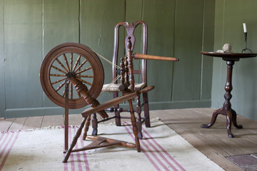 Old Fort Western, old wooden fort located in Augusta, Maine and built in 1754.  It is America's old surviving wooden fort.  Old spinning wheel.