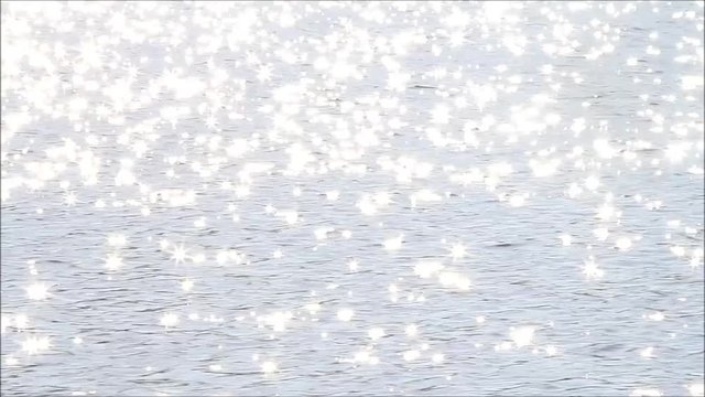 sun stars reflections on water
