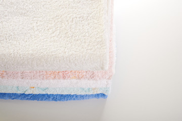 stack of towels on a white background