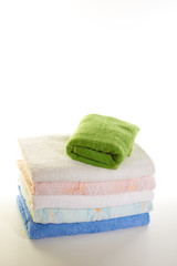 stack of towels on a white background