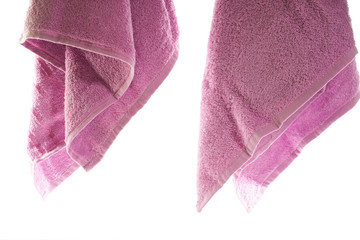 towels hanging on a white background