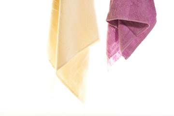 Fototapeta na wymiar towels hanging on a white background