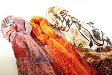 colorful scarves on a white background