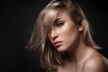 cinematic portrait of girl in dark studio