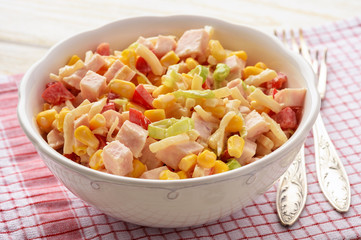 Salad with celery roots,corn, leek, pepper, ham and natural yogurt.