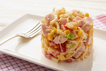 Salad with celery roots,corn, leek, pepper, ham and natural yogurt.