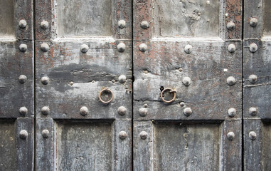  Details of an ancient Italian door in Florence, Italy