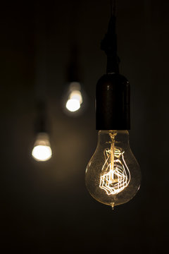 LED bulbs imitates filament electrical lamp with glowing filament