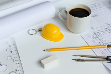 architect tools on white background with drawings apartments top view