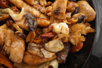 Chinese food. Chicken pork and veal with vegetables