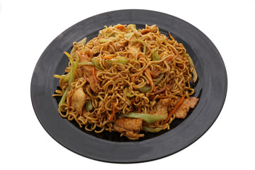 Chinese food. Noodles with pork and vegetables