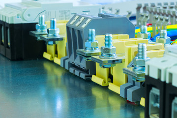 electrical terminals and circuit breakers on the mounting panel