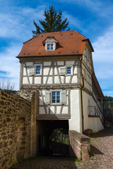Residential tudor style house with blue sky in background