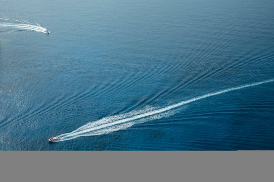 Aerial view of boats leaving trails in sea, Zante, Greece