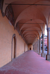 Italy, Bologna portico of ss Annunziata church in the city downtown.