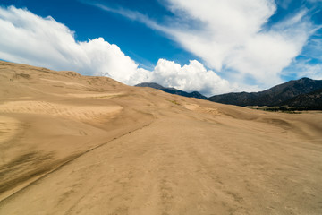 Fototapeta na wymiar Sand and Clouds: Great Sand Dunes National Park in Colorado