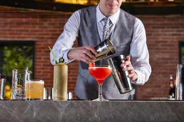 Bartender preparing cocktail