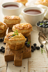 Puff pastries with cheese and berry filling