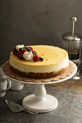 New York cheesecake on a cake stand