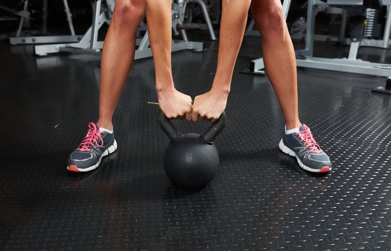 Hands with dumbbell