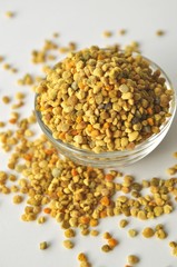 Bee Pollen granules in a glass bowl
