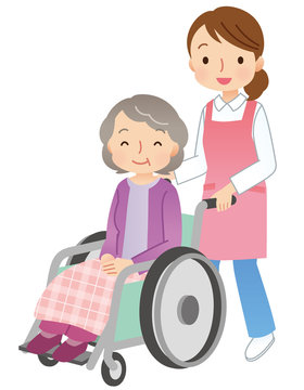 車椅子に乗る高齢者　介護スタッフ