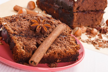 Gingerbread or dark cake with chocolate, cocoa and plum jam, delicious dessert