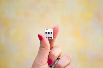 the dice in hand