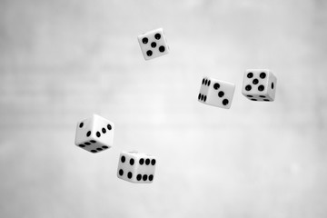 dice thrown into the air