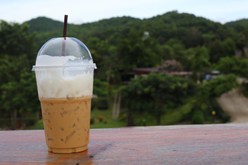Ice coffee and mountains view
