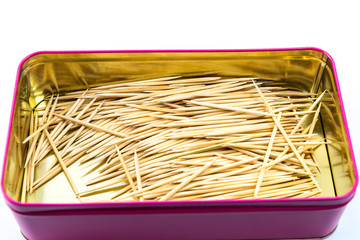Toothpicks in stylish metal box isolated on white background