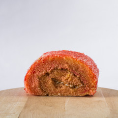 Cake roll dating berry put on the cutting boards wood white backgrund