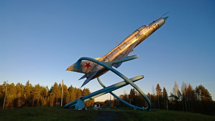 Old plane on a pedestal in Russia