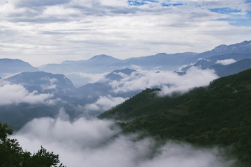 High mountains and clouds, beautiful nature landscape