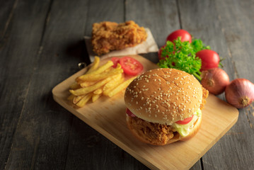 Closeup of home made burgers on wooden background