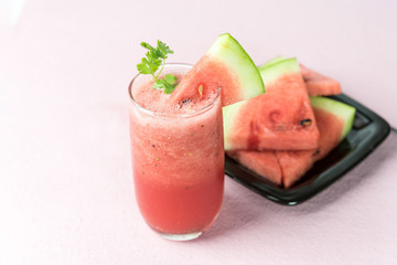 watermelon juice on pink background