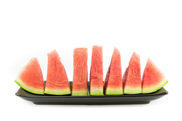 Slices of watermelon on white background