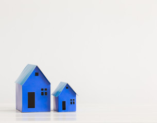 blue paper houses on white background