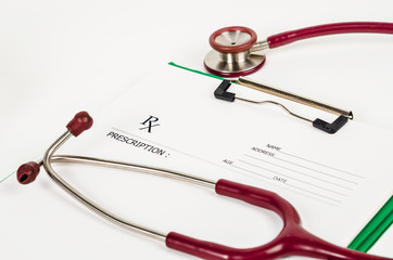 prescription form with stethoscope.