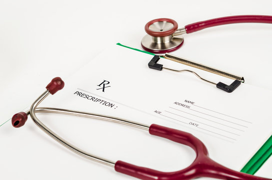 prescription form with stethoscope.