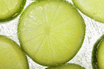 Lime slices in ice